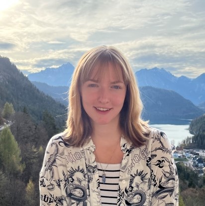 colorfull illustration of a woman next to a sun